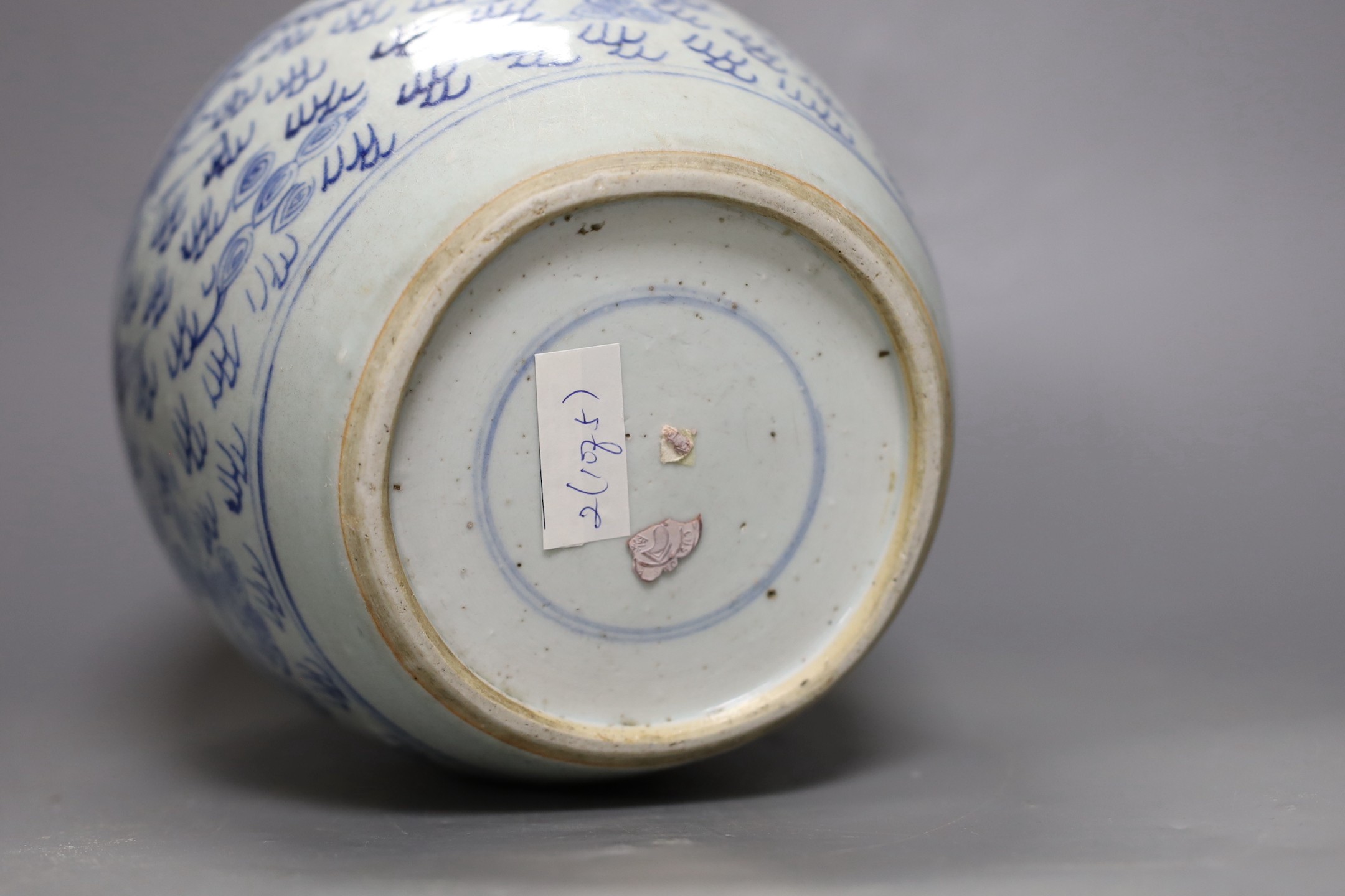 An 18th century Chinese provincial blue and white ‘dragon and phoenix’ jar, 19cm